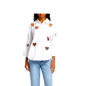 Alice and Olivia White Finley Shirt with heart cut outs.